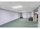 Spacious basement with carpeting, ideal for customization and additional living space at 123 Lucy Ln, Statesville, NC 28625