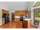 Well-lit kitchen with stainless steel appliances and hardwood floors at 123 Lucy Ln, Statesville, NC 28625