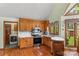The kitchen features stainless steel appliances, a window and hardwood floors at 123 Lucy Ln, Statesville, NC 28625