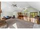 Large living room features an open floor plan and a charming stone fireplace at 123 Lucy Ln, Statesville, NC 28625