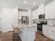 Bright kitchen with an island, granite countertops, stainless steel appliances, and modern light fixtures at 1279 31St St, Conover, NC 28613