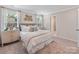 Serene main bedroom with soft carpet, natural light, and calming decor at 1279 31St St, Conover, NC 28613
