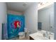 bathroom featuring a shower and blue-themed shower curtain and neutral-colored walls at 12915 Settlers Trail Ct, Charlotte, NC 28278