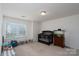 Cozy bedroom with neutral carpeting and bright walls, perfect for a Bedroom or room at 12915 Settlers Trail Ct, Charlotte, NC 28278