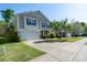 Suburban home with a two-car garage, driveway, and green lawn in a Gathering-friendly neighborhood at 12915 Settlers Trail Ct, Charlotte, NC 28278