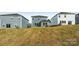 Wide shot of the home's exterior, backyard, and sunroom attachment at 1305 31St Ne St, Conover, NC 28613