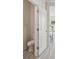 Powder room featuring modern fixtures and tile flooring next to a staircase at 1305 31St Ne St, Conover, NC 28613