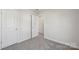 Neutral bedroom with plush carpeting, white trim, and a door leading to another room at 1305 31St Ne St, Conover, NC 28613