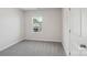 Cozy bedroom with neutral walls, plush carpeting, and a bright window with a neighborhood view at 1305 31St Ne St, Conover, NC 28613