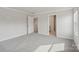 Spacious bedroom with plush carpet, gray walls, and access to the bathroom at 1305 31St Ne St, Conover, NC 28613