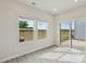 Bright living room with luxury vinyl flooring, large sliding glass door, and windows with great outdoor views at 1305 31St Ne St, Conover, NC 28613