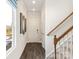 Inviting hallway features hardwood floors, staircase, and ample natural light, creating a welcoming entrance at 1329 31St Ne St, Conover, NC 28613