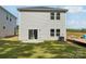 Newly constructed home with grassy backyard, patio, and a well-manicured lawn perfect for outdoor enjoyment at 1466 31St Ne St, Conover, NC 28613