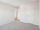 Neutral bedroom featuring plush carpeting, a closet, and two doors at 1466 31St Ne St, Conover, NC 28613