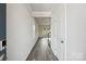 Inviting hallway with wood floors, leading to a bright living area and staircase at 1466 31St Ne St, Conover, NC 28613