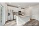 Contemporary kitchen features stainless steel appliances, granite countertops, and white cabinetry offering ample storage at 1466 31St Ne St, Conover, NC 28613