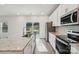 Bright and modern kitchen featuring stainless steel appliances, granite countertops, and a seamless transition to outdoor views at 1466 31St Ne St, Conover, NC 28613