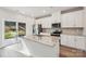 Stylish kitchen island with granite countertops, stainless steel appliances, and seamless indoor-outdoor living transition at 1466 31St Ne St, Conover, NC 28613