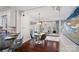 An eat-in kitchen flows to the living room and features a round table and seating for four at 1624 Chadmore Nw Ln, Concord, NC 28027