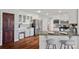 Traditional kitchen featuring stainless appliances, granite countertops, and white cabinets with crown molding at 1624 Chadmore Nw Ln, Concord, NC 28027