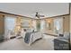 Large bedroom with natural light, a ceiling fan, and neutral decor at 1624 Chadmore Nw Ln, Concord, NC 28027