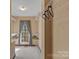 Large walk-in closet with multiple shelves and a window at 1624 Chadmore Nw Ln, Concord, NC 28027