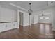 Spacious living room with wood floors, built-ins, and stylish lighting at 1695 Agner Rd, Salisbury, NC 28146
