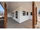 Inviting covered porch featuring sturdy wood columns and ample space for outdoor seating, perfect for relaxing at 1695 Agner Rd, Salisbury, NC 28146
