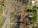 Top-down aerial showing a home, detached garage, and backyard in a suburban neighborhood at 2418 Acapulco Dr, Gastonia, NC 28054