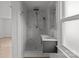 This bathroom features a stylish sink, shower, and a window at 2418 Acapulco Dr, Gastonia, NC 28054