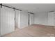 Bright bedroom showcasing sliding doors that lead to an ensuite bathroom at 2418 Acapulco Dr, Gastonia, NC 28054