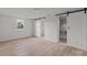 Bright bedroom featuring a large window and white-colored trim and walls at 2418 Acapulco Dr, Gastonia, NC 28054