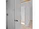 Close up of a white tiled walk-in shower with a modern showerhead at 2418 Acapulco Dr, Gastonia, NC 28054
