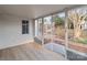 Sunroom with lots of windows looking out onto the yard with a gazebo at 2418 Acapulco Dr, Gastonia, NC 28054