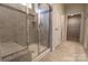 New construction bathroom with tiled walk-in shower featuring seating and a glass enclosure at 244 White Apple Way, Statesville, NC 28625