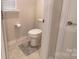 Clean, white toilet and tiled floors in a well-maintained bathroom with a modern toilet at 244 White Apple Way, Statesville, NC 28625