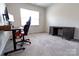 Spacious bedroom featuring neutral carpet, a large window and two modern desks at 244 White Apple Way, Statesville, NC 28625