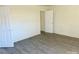 A bright bedroom features hardwood floors and an open door at 2546 Amber Crest Dr, Gastonia, NC 28052