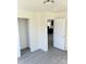 Light and bright bedroom showcasing new flooring, a large closet, fresh paint and new lighting fixture at 2546 Amber Crest Dr, Gastonia, NC 28052