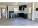 Kitchen area featuring newly installed dark blue cabinets and an open layout, ready for appliances at 2546 Amber Crest Dr, Gastonia, NC 28052