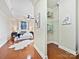 Spacious primary bedroom showcasing walk-in closet and plenty of natural light at 300 W 5Th St # 402, Charlotte, NC 28202