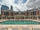 Resort-style pool area with ample seating and views of the community and skyline at 300 W 5Th St # 402, Charlotte, NC 28202