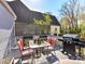 Outdoor deck with a table and chairs, perfect for dining and entertaining at 3016 Hanson Dr, Charlotte, NC 28207