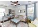 Comfortable bedroom with a desk, decorative furniture, and a soft couch at 3016 Hanson Dr, Charlotte, NC 28207