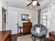 Comfortable bedroom with a cozy papasan chair and ample natural light at 3016 Hanson Dr, Charlotte, NC 28207