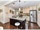 Charming kitchen featuring granite countertops, stainless steel appliances, and island seating at 3016 Hanson Dr, Charlotte, NC 28207