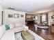 Open living and dining areas with hardwood floors and ample natural light at 3016 Hanson Dr, Charlotte, NC 28207