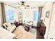 Bright home office with hardwood floors, multiple windows, and neutral décor at 3016 Hanson Dr, Charlotte, NC 28207