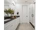 Bathroom with double vanity, granite countertops, and a glass-enclosed shower, providing a luxurious space at 317 Old Town Village Rd, Waxhaw, NC 28173