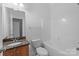 Bathroom featuring single vanity, shower and tub at 3907 Voltaire Dr, Monroe, NC 28110